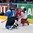 MINSK, BELARUS - MAY 24: Tomas Hertl #48 of the Czech Repubilc gets tangled up with Finland's Tuukka Mantyla #18 during semifinal round action at the 2014 IIHF Ice Hockey World Championship. (Photo by Andre Ringuette/HHOF-IIHF Images)

